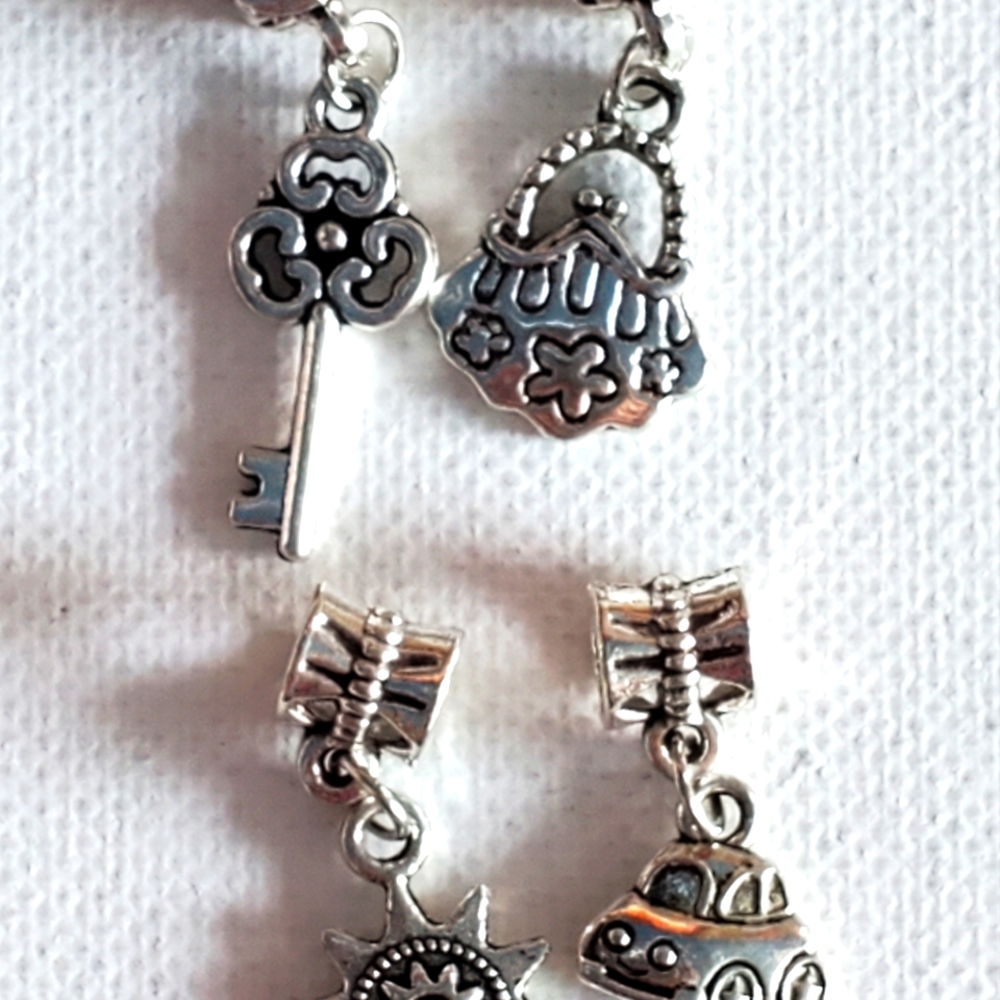 charms. NWOT. fits in Pandora Bracelet. (E)